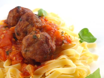 MOZZARELLA-STUFFED PORK MEATBALLS WITH HOMEMADE TOMATO SAUCE