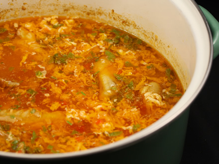 TRADITIONAL ROMANIAN CHICKEN SOUP WITH TOMATO, EGG, AND LOVAGE