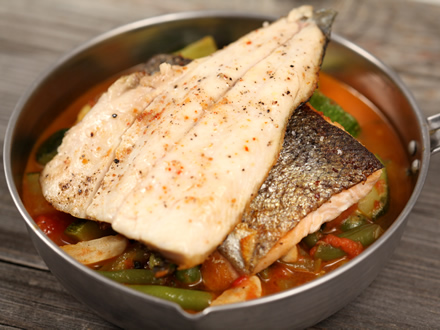 PAN-SEARED TROUT FILETS WITH MIXED SPRING VEGETABLES AND HERBS