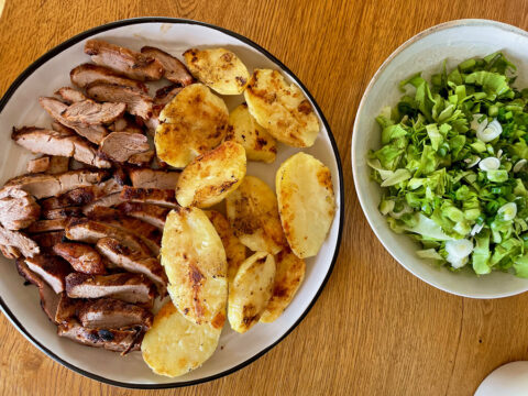 GRILLED TENDER PORK TENDERLOIN SLICES WITH NEW POTATOES