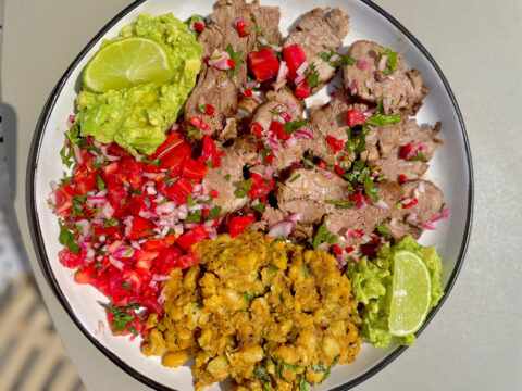 MEXICAN-INSPIRED PORK TENDERLOIN PLATTER WITH GUACAMOLE, PICO DE GALLO & REFRIED BEANS