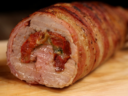 PORK TENDERLOIN ROLL WITH ROASTED TOMATOES, GOAT CHEESE & BASIL, WRAPPED IN BACON
