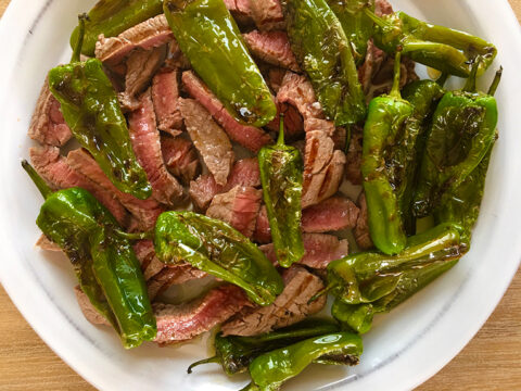Grilled Beef Tenderloin Slices with Padron Peppers