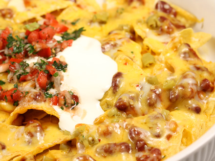 Tex-Mex nachos recipe, chili beans nachos, easy nachos with cheese, pickled hot peppers, homemade pico de gallo, quick snack recipes, oven-baked nachos, tortilla chips recipes, spicy nachos, party appetizer ideas